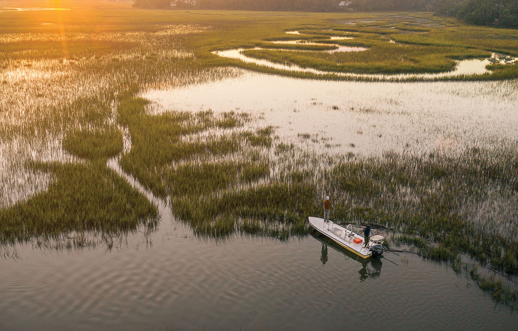 Stalking Redfish Through The Marsh - Bay Flats Lodge