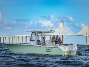 Fishing boat powered by a single outboard