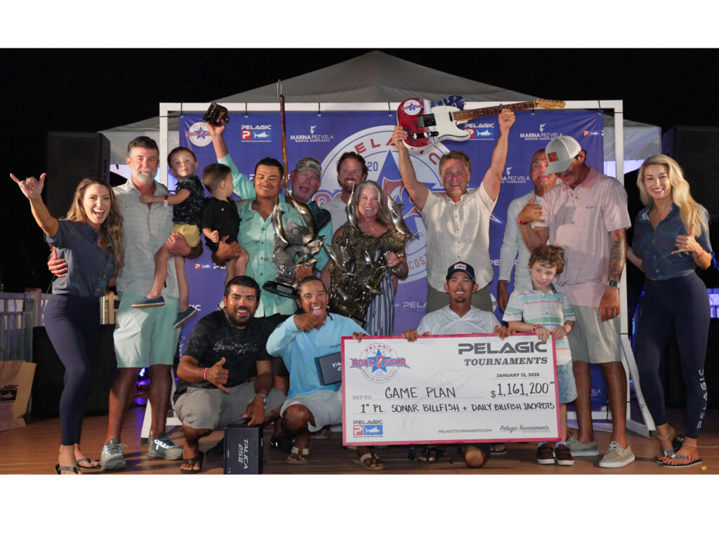 Team Game Plan onstage with the big billfish check from the Pelagic Rockstar Offshore Tournament.