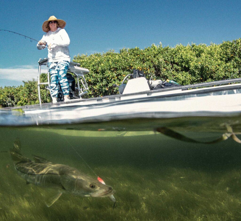 Fishing for snook from a skiff