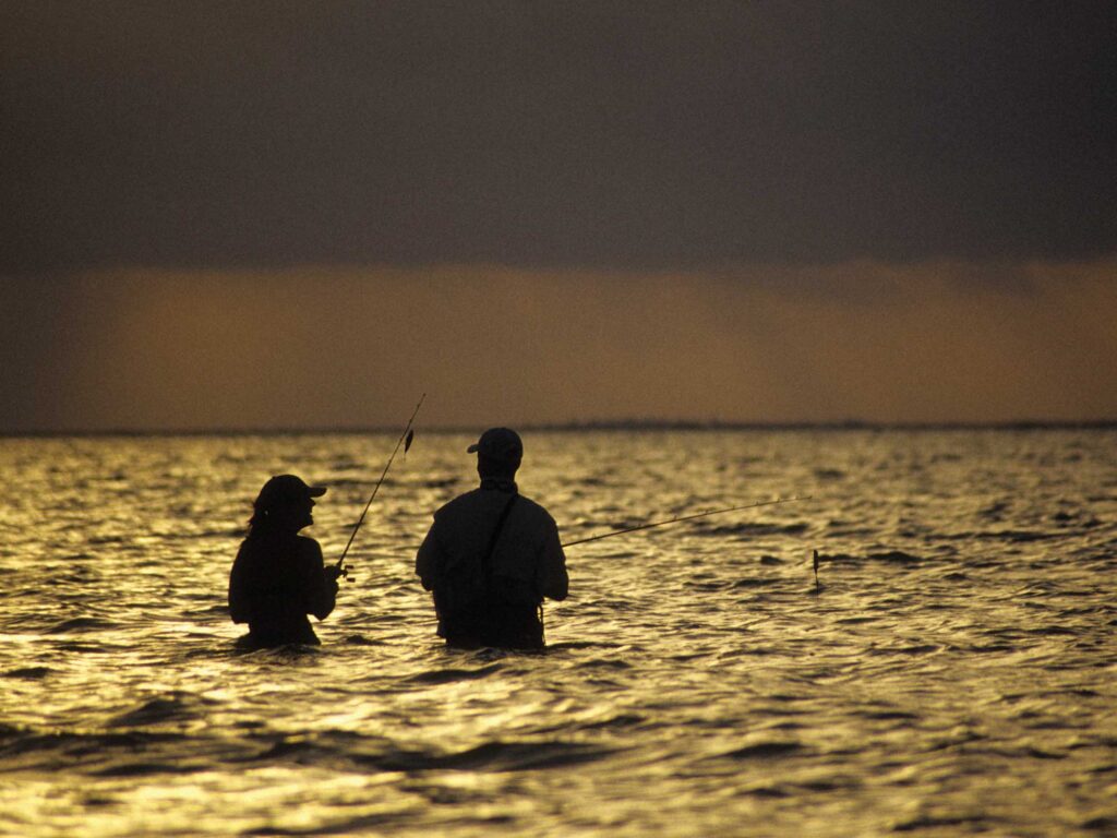 Anglers wade-fishing for seatrout