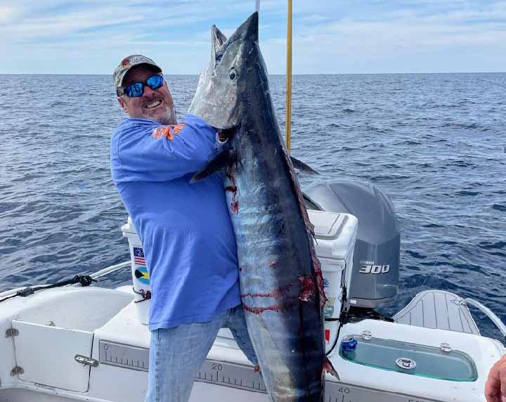 SWS0322-Big-Wahoo-South-Carolina-1 Fisherman holding up giant wahoo