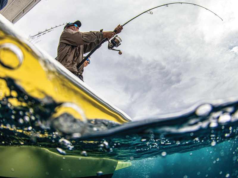 SWS0923-Fish-Faster-3 Angler fighting a big saltwater fish