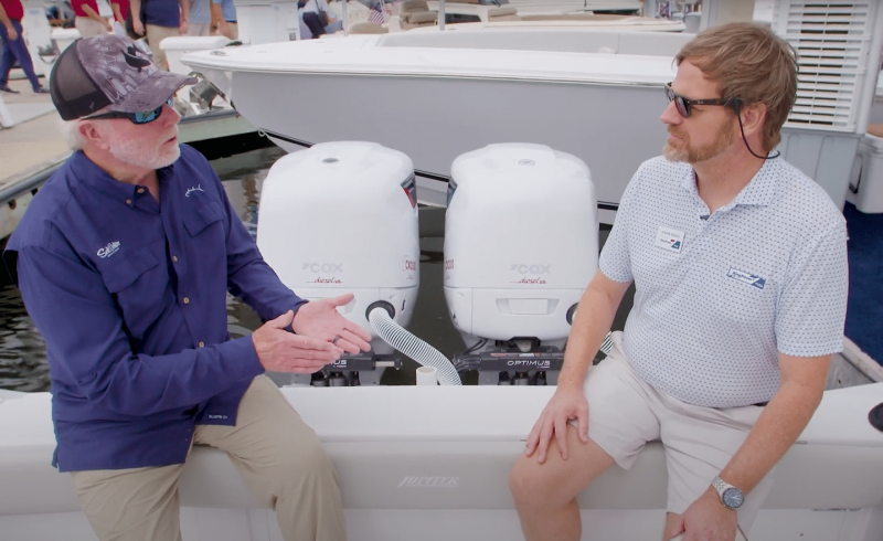 flibs-2023-cox-marine-outboards Jim Hendricks speaking with Chuck Gould of Ring Power.